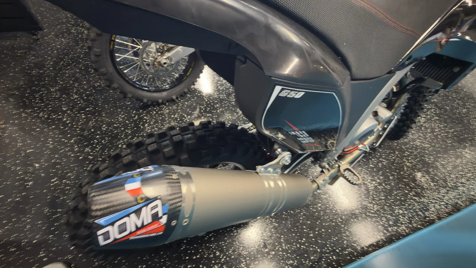 Black AJP PR7 at Salto Moto: DOMA exhaust