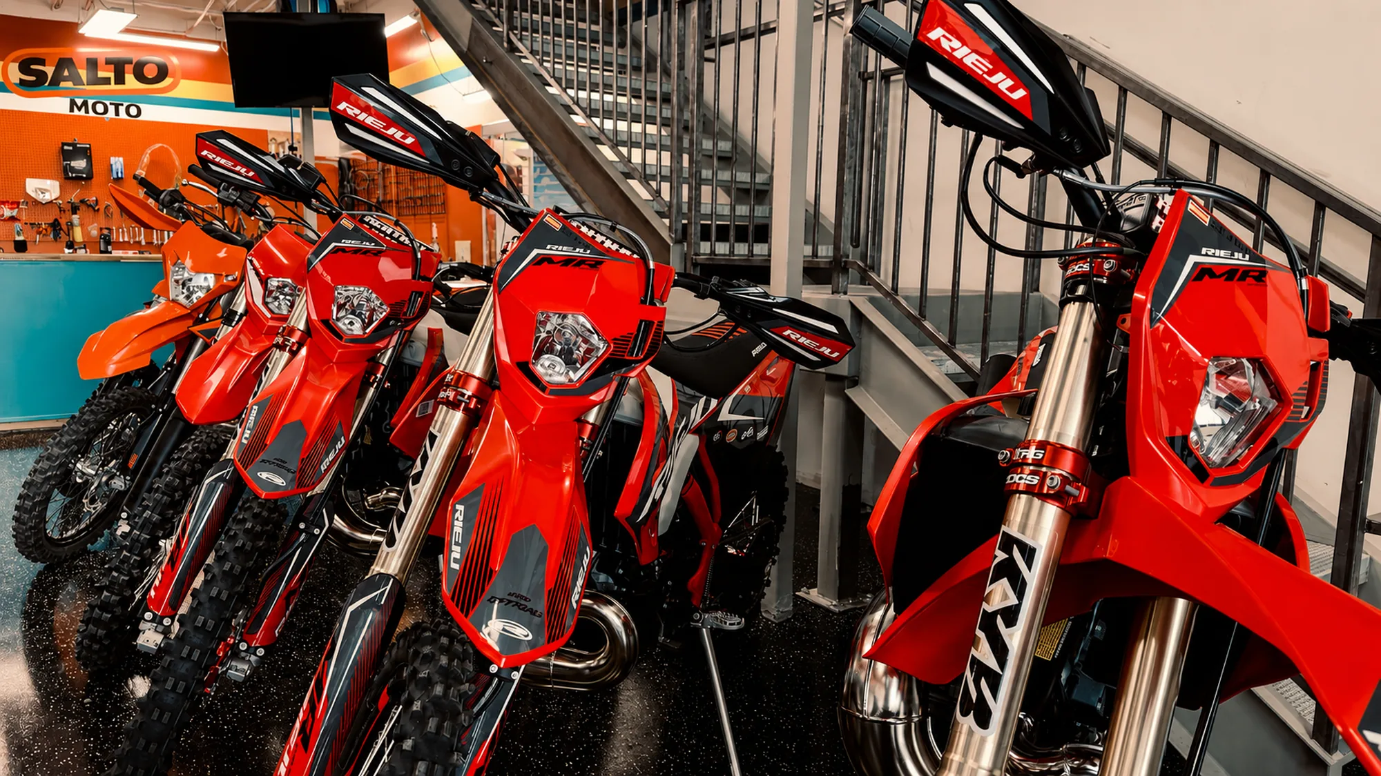 A row of new Rieju enduros at Salto Moto